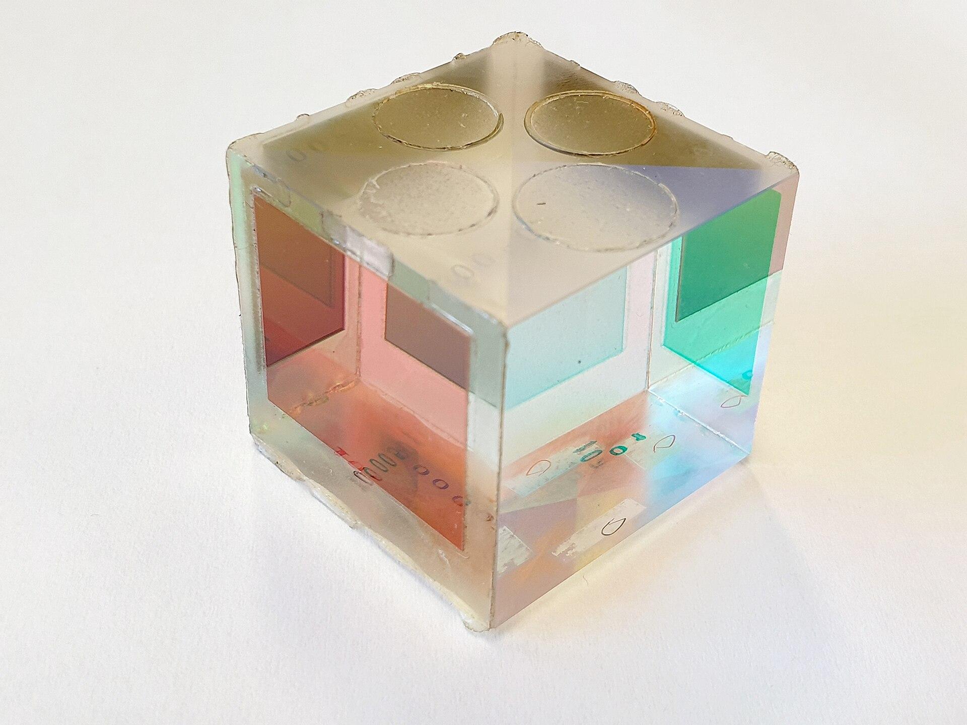 Glass prism cube with colour-split faces